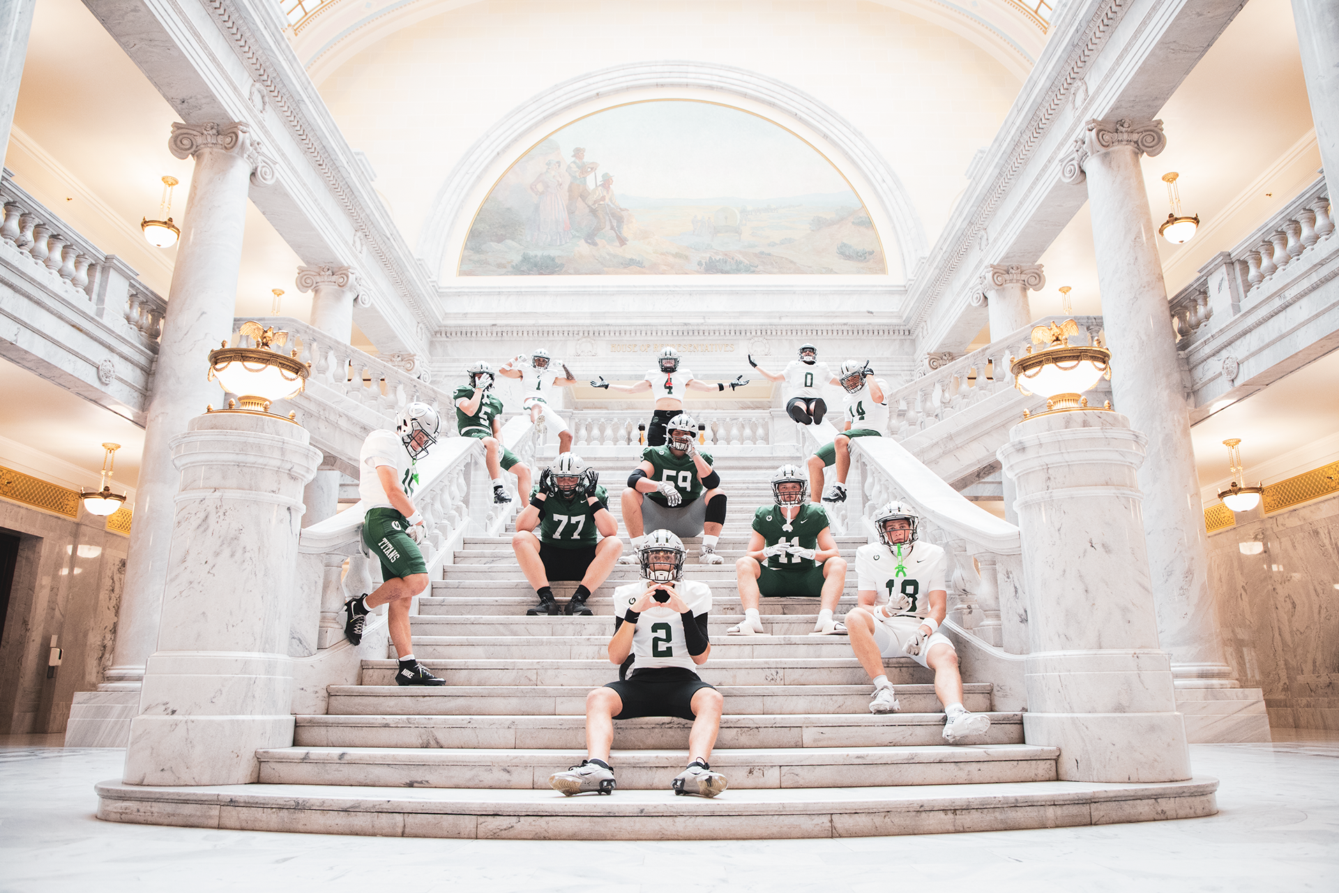 Football team on Utah State Capitol stairs