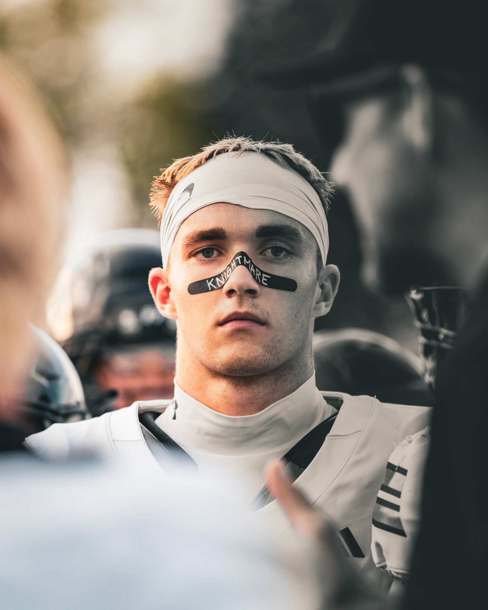 Portrait of a player with eye black reading Knightmare